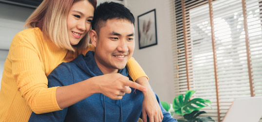 couple with laptop